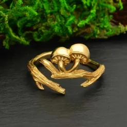 Bronzen ring tak en paddenstoelen