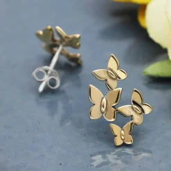 Zilveren oorbellen met bronzen vlinderzwerm
