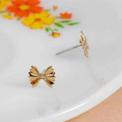 Zilveren oorbellen met bronzen farfalle