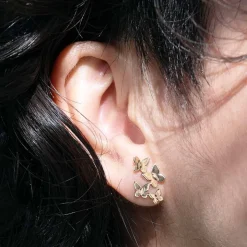 Zilveren oorbellen met bronzen vlinderzwerm