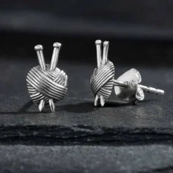 Zilveren oorbellen wol en breinaalden