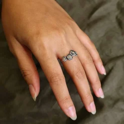 Zilveren/bronzen ring madeliefjesketting